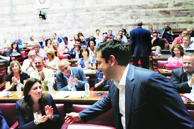 आर्थिक मदतीसाठी ग्रीसने स्वीकारलेल्या योजनेवर आता संसदेत मतदान नाणेनिधीची समझोत्यावर टीका