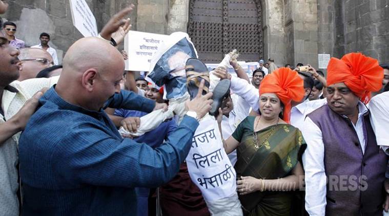 चित्रपटात इतिहासाचे विकृतीकरण करण्यात आले असून तो प्रदर्शित होऊ देणार नाही अशी भूमिका घेत चित्रपट दिग्दर्शक संजय लीला भन्साळी यांचे फोटोही जाळण्यात आले. 