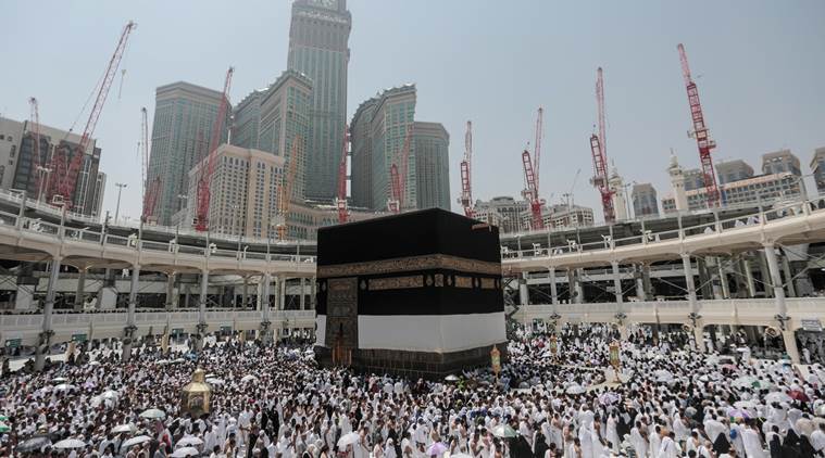 Muslim pilgrims circle the Kaaba, the cubic building at the Grand Mosque in the Muslim holy city of Mecca, Saudi Arabia