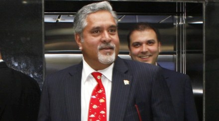 RPT--New Delhi: A file photo of liquor baron Vijay Mallya who is abroad, has told Supreme Court through his lawyer on Wednesday that he is willing to pay up Rs 4,000 crore to the banks by September 2016. Mallya is facing legal proceedings for allegedly defaulting loans of over Rs 9,000 crores from various banks. PTI Photo (PTI3_30_2016_000275B)
