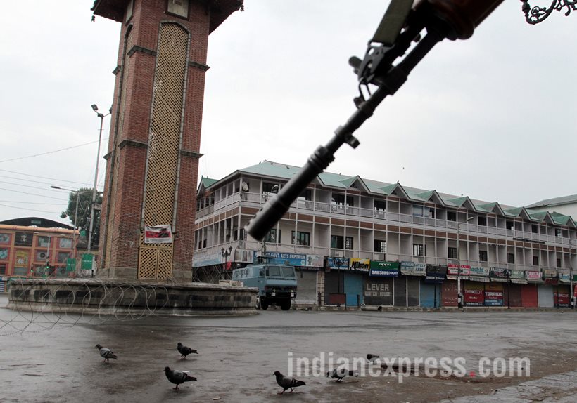 Violence affected all the major towns of Kashmir despite authorities imposing curfew-like restrictions, suspending mobile Internet services, and resorting to teargas and aerial firing. There was complete lockdown in Valley. (Express Photo by Shuaib Masoodi)