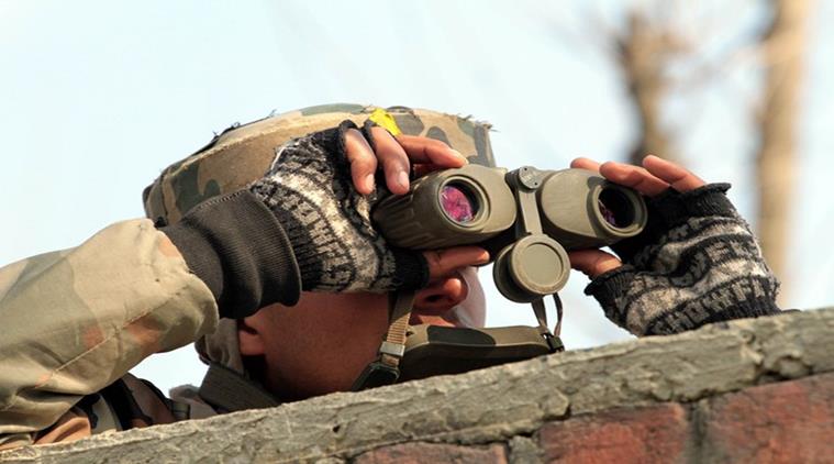Army soldier uses binocular to locate militant positions near the site of a gunbattle in Sempora Pampore, some 15 km south of Srinagar on Monday. The encounter that started on saturday (FEB 20) entered third day on Monday.EXPRESS PHOTO BY SHUAIB MASOODI 22-02-2016.