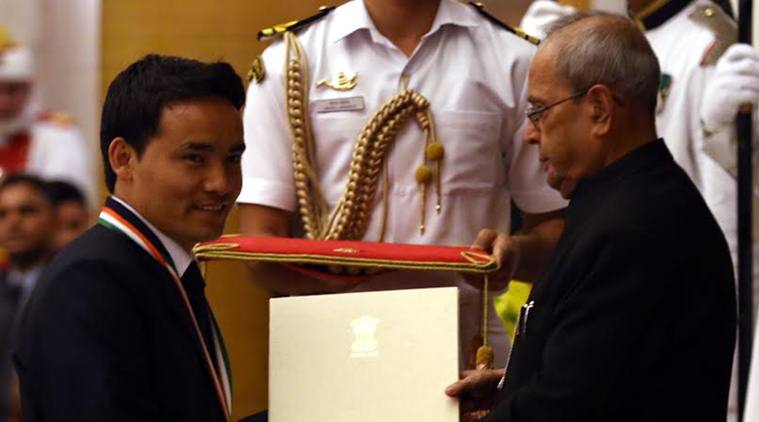 Shooting Jitu Rai receiving Rajiv Gandhi Khel Ratna Award from the President Pranab mukherjee at Rastrapati Bhawan in new Delhi on Monday express photo by Prem Nath Pandey 29 aug 16