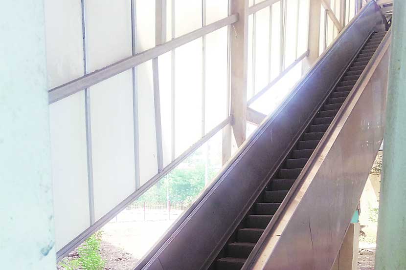 escalator , Kharghar  railway station