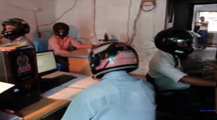 goverment office in Bihar, Employees wear helmets