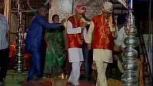 Madhya Pradesh, Two men, married, symbolic gesture, appease, rain gods, Indore