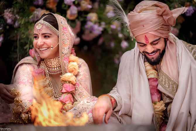 Anushka, Virat , Anushka Virat twin in ivory and gold outfits , Anushka Virat wedding outfit look , Sports news, Anuskha shamra , Anushka Sharma and Virat Kohli get married in Italy, see first photos , Loksatta, Loksatta news, Marathi, Marathi news