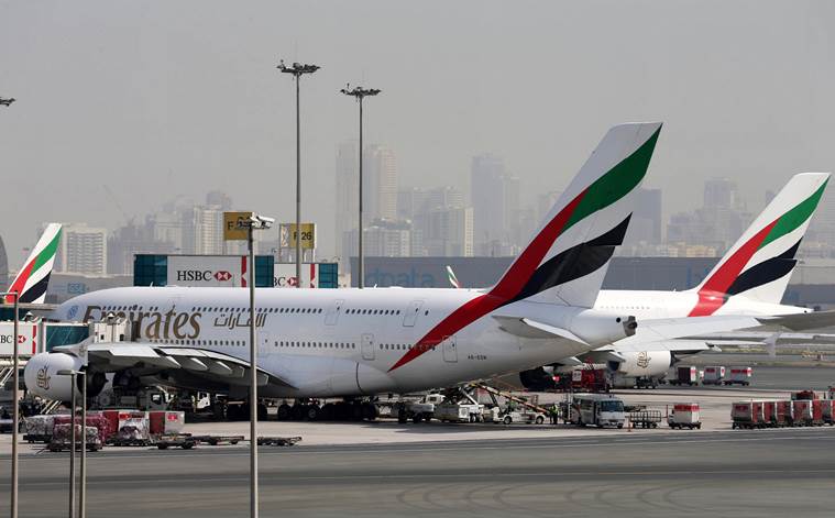(Emirates Airlines aircrafts are seen at Dubai International Airport, United Arab Emirates May 10, 2016. REUTERS/Ashraf Mohammad)