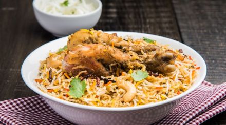 authentic indian chicken biryani with onion raita