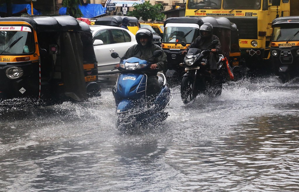 Waterlogging in Andheri west after a heavy shower in Mumbai on Friday afternoonExpress Photo by Amit Chakravarty 02-08-19