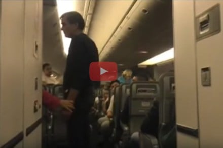 drunk Passengers tries to open plane door