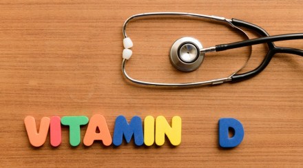 Vitamin D colorful word on the wooden background