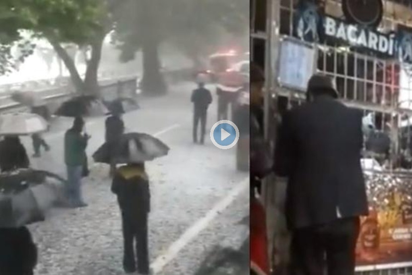 Video: याला म्हणतात Dedication… गारपीट होत असतानाही छत्री घेऊन लावली दारुसाठी रांग