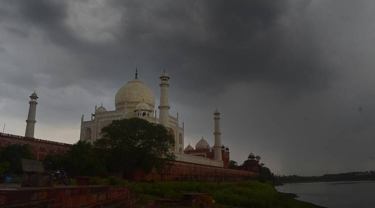 Dark clouds gather in the sky over Taj Mahal, in Agra, Saturday, May 30, 2020. (PTI Photo)