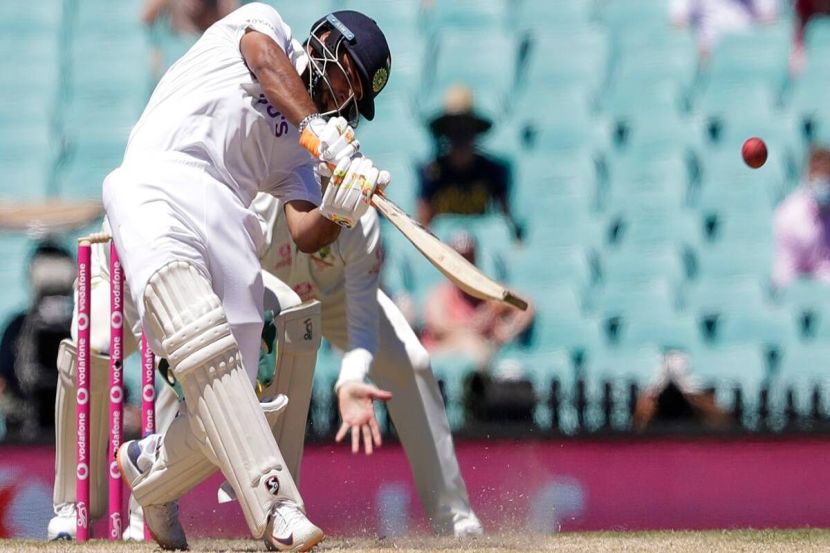 India's Rishabh Pant hits a six during play on the final day of the third cricket Test between India and Australia at the Sydney Cricket Ground. (AP)
