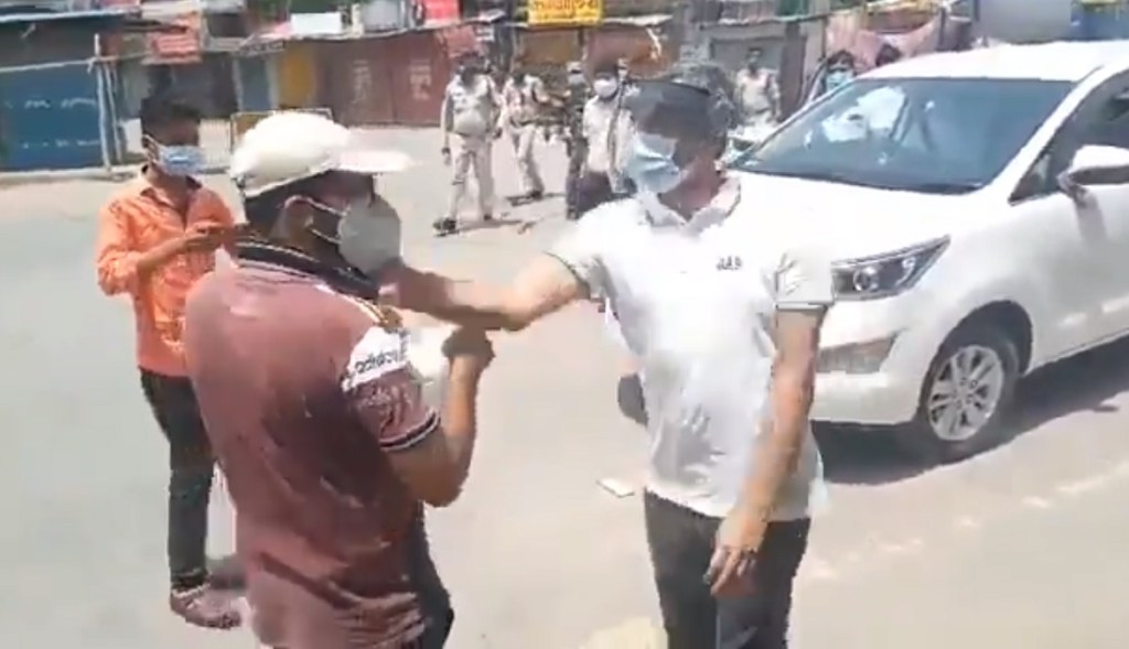 surajpur collector chhattisgarh viral video slapping a man violating lockdown rules