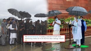 PM Modi holding his own Umbrella