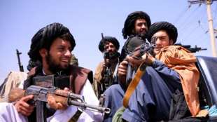 Taliban forces patrol