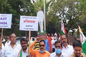 It raided companies ajit pawar relatives NCP leaders take to the streets