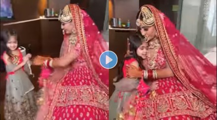 little-girl-sees-mother-dressed-as-bride