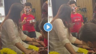 Little boy feeds mom