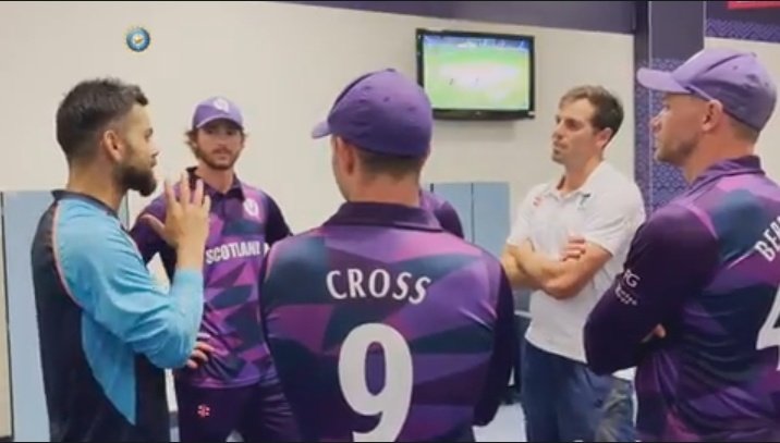 Scotland players visit Indian dressing room