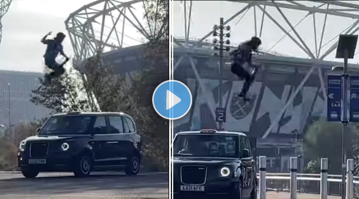 man jumping over five cars on a pogo stick hes now an official guinness