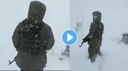 Indian soldier standing in the snow