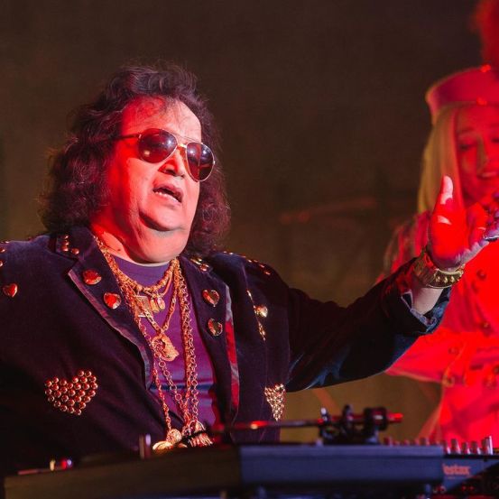 Bappi Lahiri net worth cars houses gold collection price