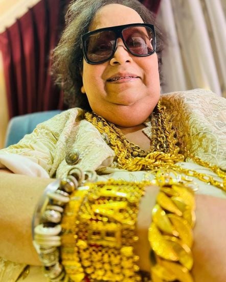 Bappi Lahiri net worth cars houses gold collection price