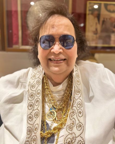 Bappi Lahiri net worth cars houses gold collection price