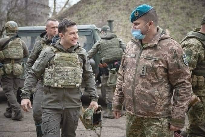 In military uniform defiant President Volodymyr Zelensky vows to defend Ukraine People called him real hero