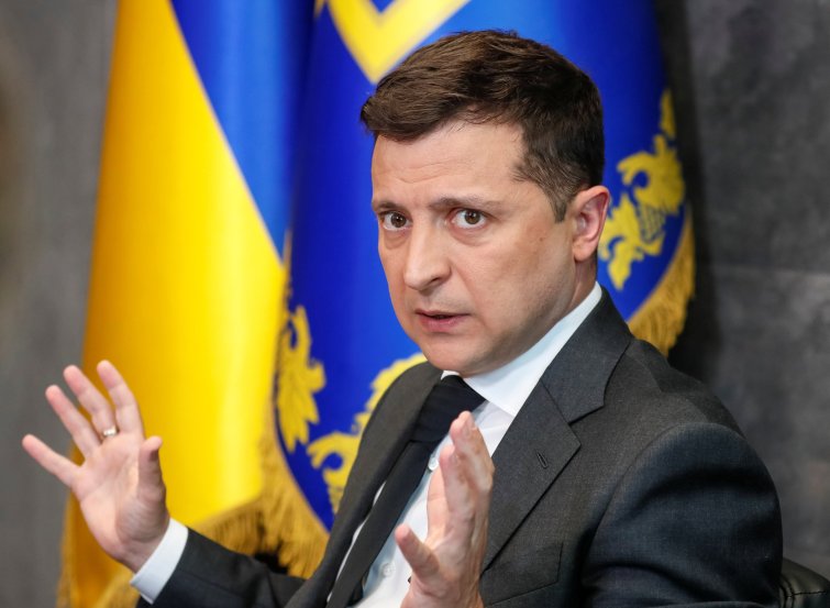 In military uniform defiant President Volodymyr Zelensky vows to defend Ukraine People called him real hero