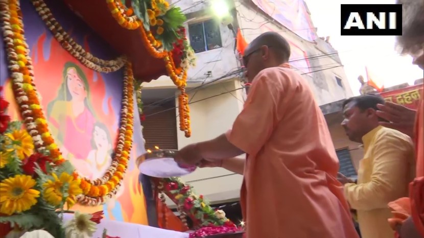 With sunglasses toy bulldozer Yogi Adityanath celebrates Holi in Gorakhpur See pics