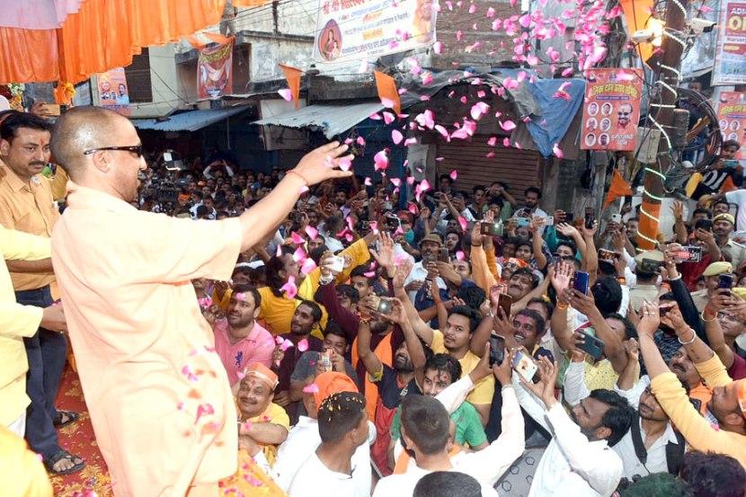 With sunglasses toy bulldozer Yogi Adityanath celebrates Holi in Gorakhpur See pics