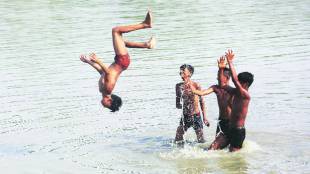 boys-playing-in-water-summer