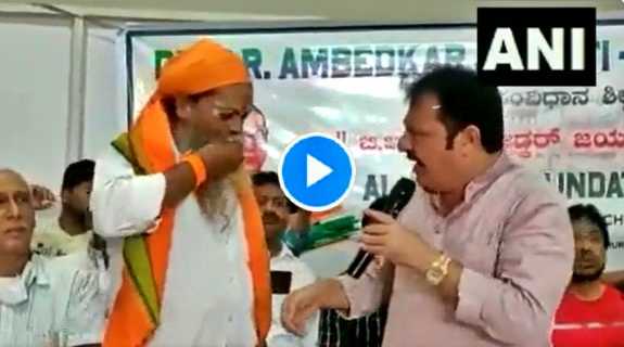 Congress MLA Zamir Khan eat chewed food of Dalit Sant Narayan in Karnataka