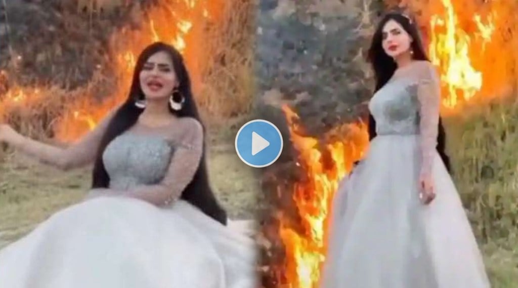 pakistani-tiktok-sensation-poses-for-video-by-forest-fire