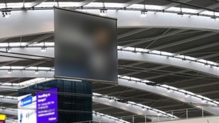 A porn video suddenly played on the TV screen at the airport