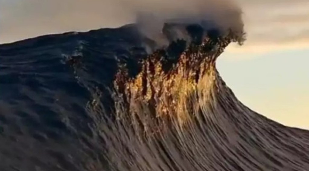 sea wave touching clouds