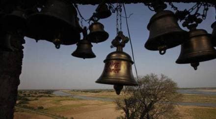 scientific reason for ringing the bell in the temple