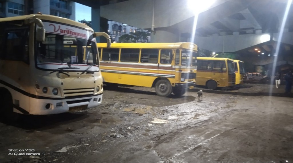 Encroachment of school bus under flyover near Seawood railway station