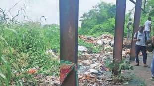 garbage piles near subway of naigaon railway station