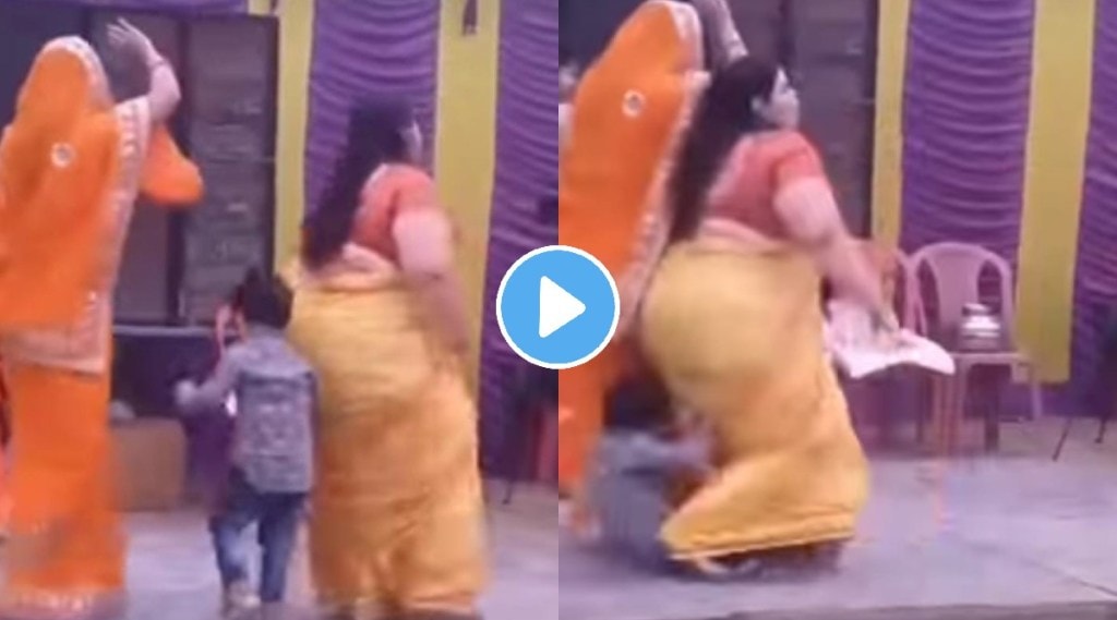 Little boy gets stuck between two women dancing on stage viral wedding dance video