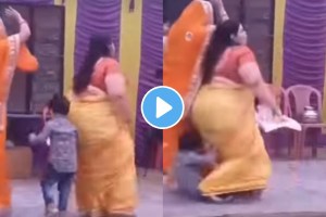 Little boy gets stuck between two women dancing on stage viral wedding dance video