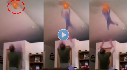 Netizens give Mixed reactions to viral video father throwing son to fetch a balloon stuck in the ceiling
