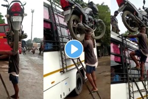 Viral Video Man climbs bus with bike on his head internet is stunned