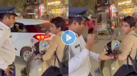 Young boy riding a scooter without a helmet gets caught by a traffic cop see what happens next in this viral video