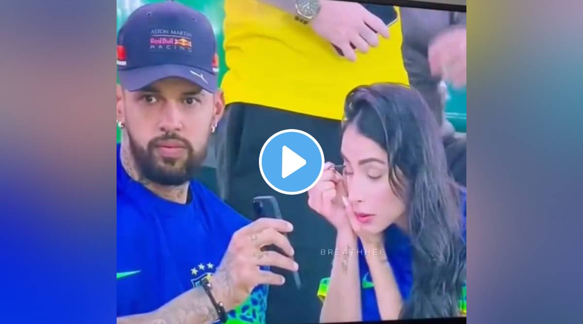 Man helps wife with makeup while watching match in stadium viral video wins internet calls it Husband of the year