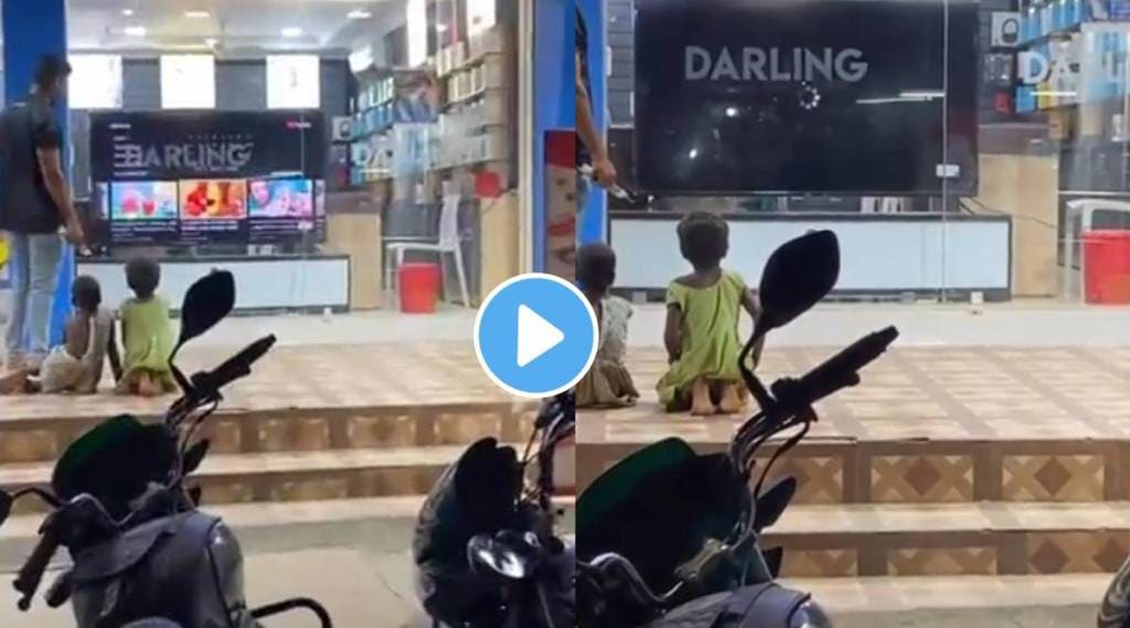 Viral video Salesmans kind gesture towards poor kids who wants to watch tv from outside the showroom wins internet